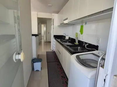 A cozinha ou kitchenette de Apartamento encantador em Bombinhas