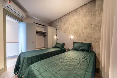 Uma cama ou camas num quarto em Aion 306 - Duplex compacto com 2 quartos - 50 metros do mar!