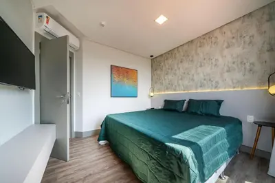 Uma cama ou camas num quarto em Aion 306 - Duplex compacto com 2 quartos - 50 metros do mar!