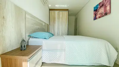 Uma cama ou camas num quarto em Cobertura Duplex Quebec
