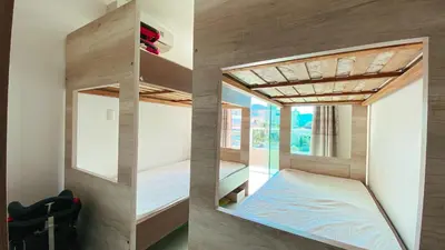 Uma cama ou camas num quarto em Cobertura Duplex Quebec