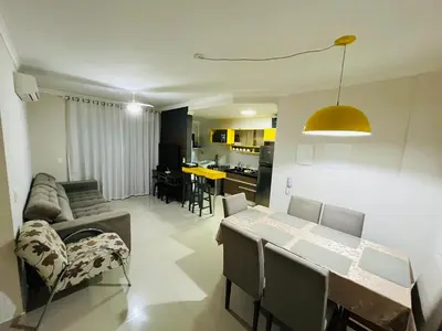 Uma área de estar em Apartamento 6 pessoas em bombas