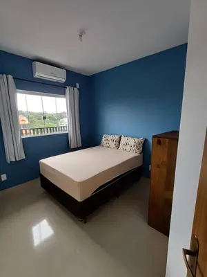 Uma cama ou camas num quarto em Ap 05 Praia de Mariscal