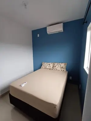 Uma cama ou camas num quarto em Ap 05 Praia de Mariscal