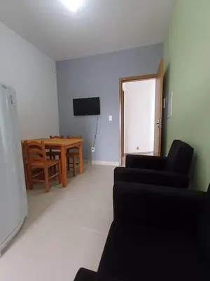 Uma área de estar em Ap 05 Praia de Mariscal