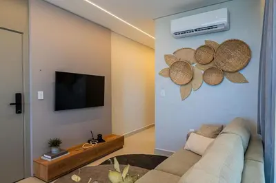 Uma televisão e/ou sistema de entretenimento em East Wind 201 - Vista Mar em Mariscal