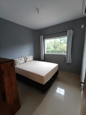 Uma cama ou camas num quarto em AP 02 Praia de Mariscal