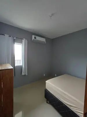 Uma cama ou camas num quarto em AP 04 Praia Mariscal 800mt mar