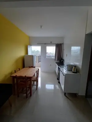 A cozinha ou kitchenette de AP 04 Praia Mariscal 800mt mar
