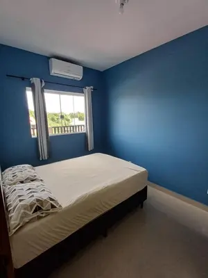 Uma cama ou camas num quarto em AP 06 Praia Mariscal 800mt mar