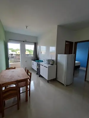 Uma área de estar em AP 06 Praia Mariscal 800mt mar