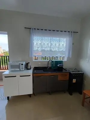 A cozinha ou kitchenette de AP Praia Mariscal 800mt mar 07