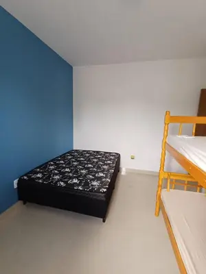 Uma cama ou camas num quarto em AP Praia Mariscal 800mt mar 07