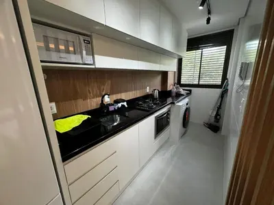 A cozinha ou kitchenette de Cód 29 - Apartamento elegante no Oasis do Atlântico com piscina e spa