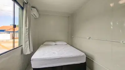 Uma cama ou camas num quarto em RJ408-02 Container a 650m de la playa de Mariscal