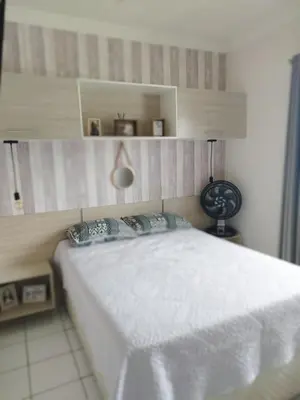 Uma cama ou camas num quarto em AP 2 Quartos