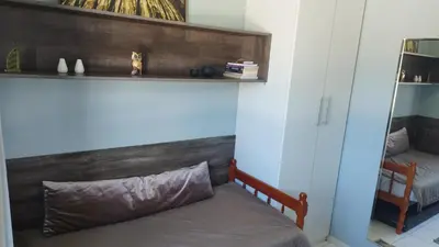Uma cama ou camas num quarto em AP 2 Quartos