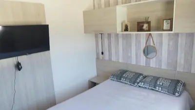 Uma cama ou camas num quarto em AP 2 Quartos