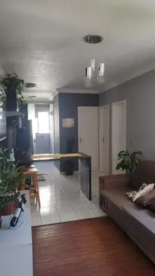 Uma área de estar em AP 2 Quartos