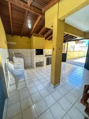 A cozinha ou kitchenette de Tucano 01 a passos do mar com área gourmet