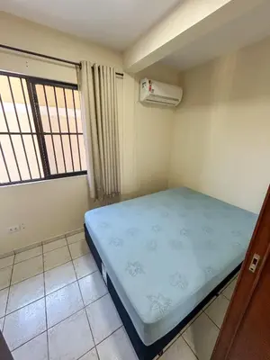 Uma cama ou camas num quarto em Tucano 01 a passos do mar com área gourmet