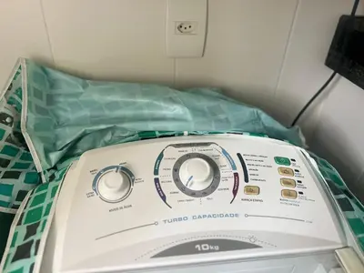 Uma cama ou camas num quarto em Completo! Apto completo na praia de Palmas OJ03I