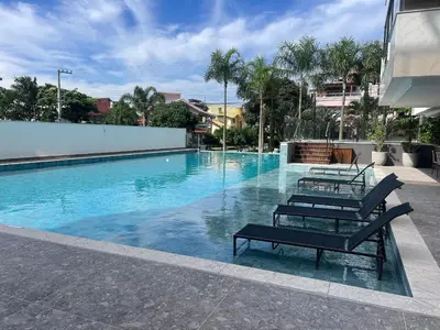 A piscina em ou perto de Lindo! Apto em Home Club em Palmas - OJ08I