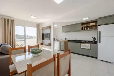 A cozinha ou kitchenette de RiNay Sol e Mar Itapema