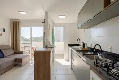 A cozinha ou kitchenette de RiNay Sol e Mar Itapema