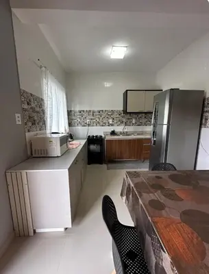 A cozinha ou kitchenette de Casa para família em Bombinhas