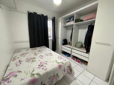 Uma cama ou camas num quarto em Apto B 17