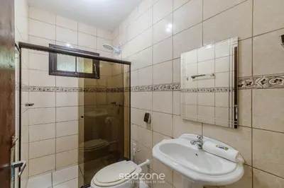 Uma casa de banho em Casa 3Q c/ Churrasqueira 140m da Praia RAE0126