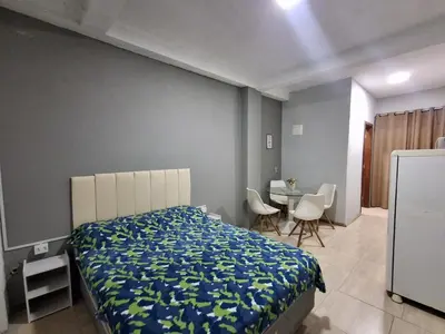 Uma cama ou camas num quarto em Residencial Zimbros 2