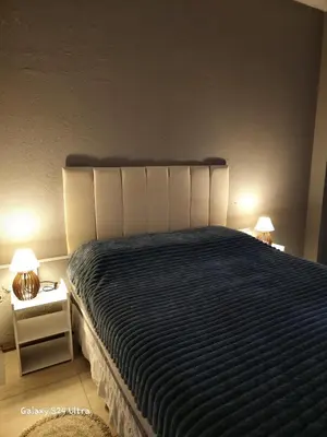Uma cama ou camas num quarto em Residencial Zimbros 2