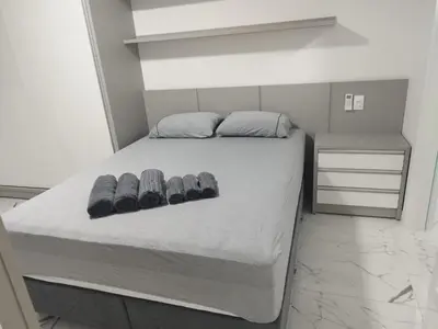 Uma cama ou camas num quarto em Apartamento temporada - Meia Praia