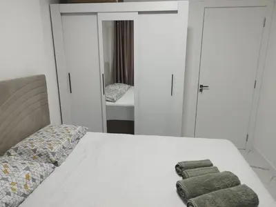 Uma cama ou camas num quarto em Apartamento temporada - Meia Praia