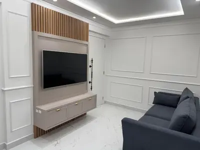 Uma televisão e/ou sistema de entretenimento em Aconchegante ap em Itapema