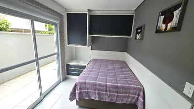 Uma cama ou camas num quarto em Sua temporada dos sonhos na praia de Palmas