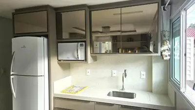 A cozinha ou kitchenette de Sua temporada dos sonhos na praia de Palmas