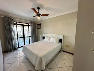 Uma cama ou camas num quarto em Residencial Paradise - Praia de Bombas - Bombinhas