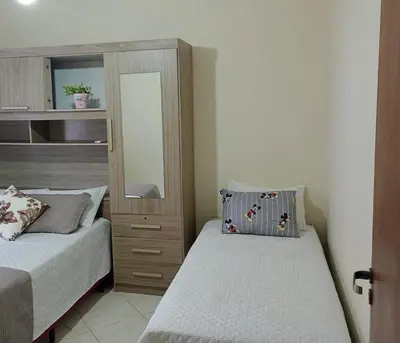 Uma cama ou camas num quarto em Cobertura com piscina a 80 mt da praia de Bombas