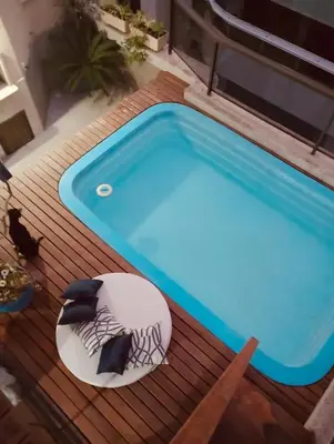 A piscina em ou perto de Cobertura com piscina a 80 mt da praia de Bombas