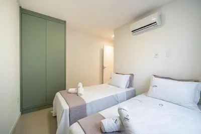 Uma cama ou camas num quarto em Achei Itapema • 803A, Mirante das Oliveiras