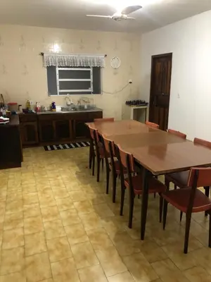 A cozinha ou kitchenette de Quartos 50 metros do mar