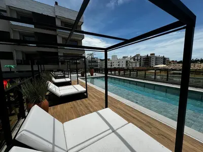 A piscina em ou perto de Cód 100 - Apartamento de 1suíte com spa e piscina