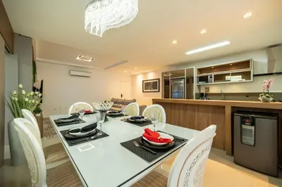 A cozinha ou kitchenette de Achei Itapema • Elegante ap 3 suítes 400m do mar