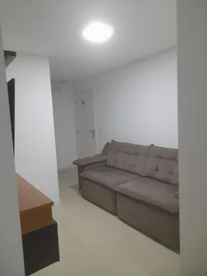 Uma área de estar em Sunset Boulevard Residence Apartamento 302
