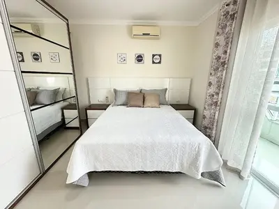 Uma cama ou camas num quarto em Costa Mar Residence - Bombinhas
