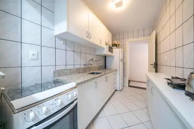 A cozinha ou kitchenette de Apto Charmoso Próx. à Praia de Itapema ZF4014