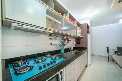 A cozinha ou kitchenette de Apartamento Aconchegante 400m da Praia YV5962